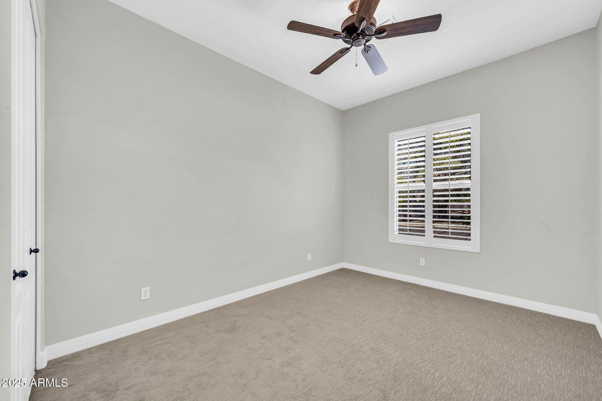 4213 East Edgemont Avenue Phoenix, AZ 85008 - Photo 24 of 35 a view of an empty room with a window
