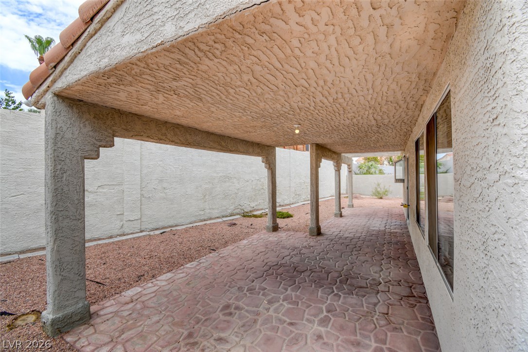 5 Tarryall Terrace Henderson, NV 89074 - Photo 44 of 44 A spacious covered patio provides a delightful outdoor living extension.