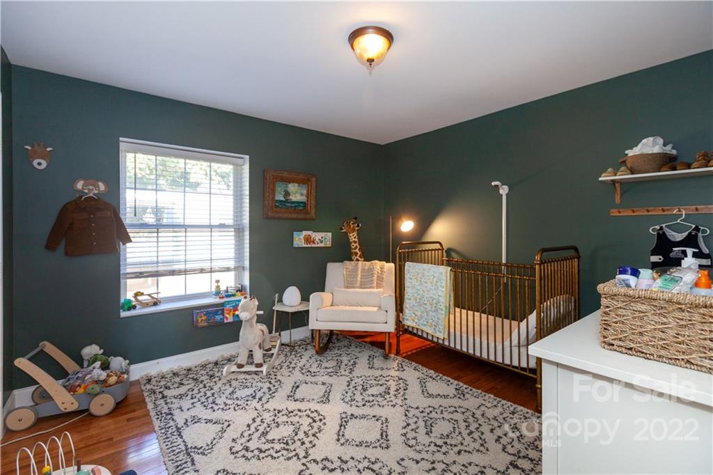 2600 Park Road, Unit C Charlotte, NC 28209 - Photo 6 of 20 a bedroom with furniture and a window