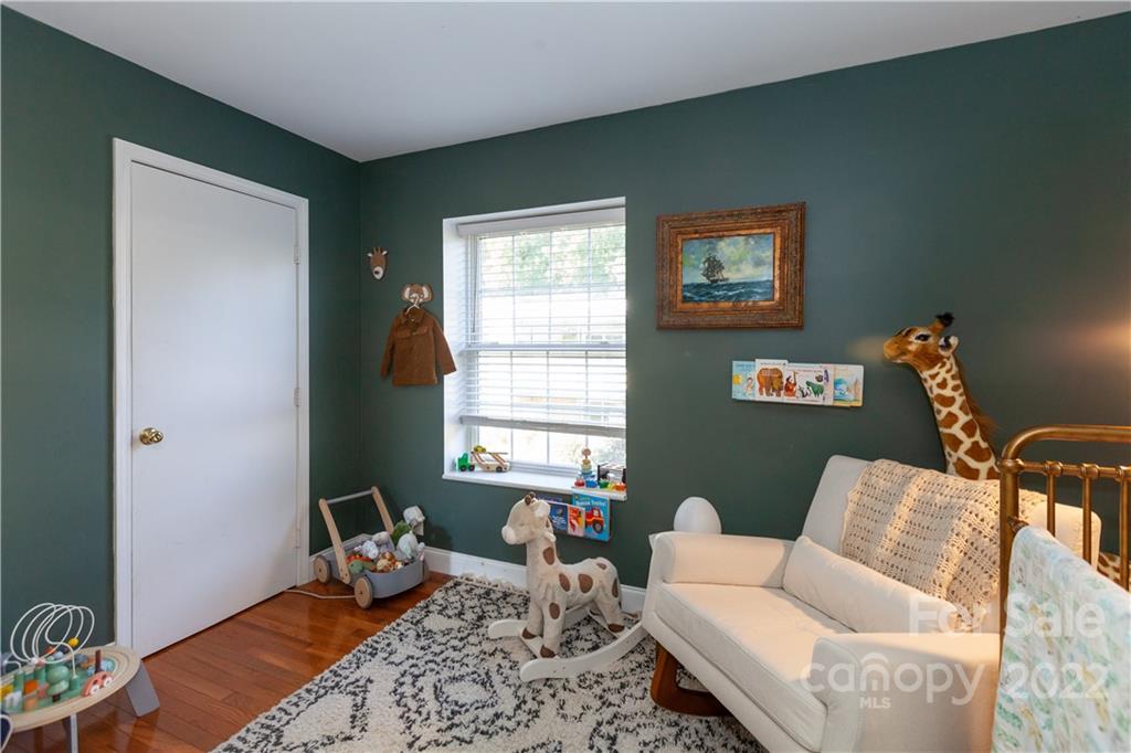 2600 Park Road, Unit C Charlotte, NC 28209 - Photo 8 of 20 a living room with furniture and a window