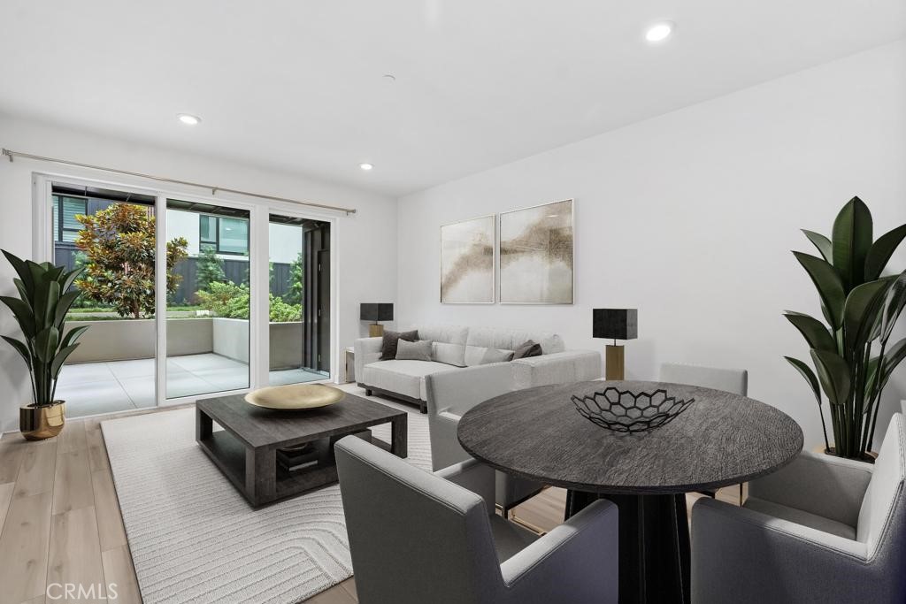 1202 Rivington Irvine, CA 92612 - Photo 1 of 52 a living room with furniture and a large window