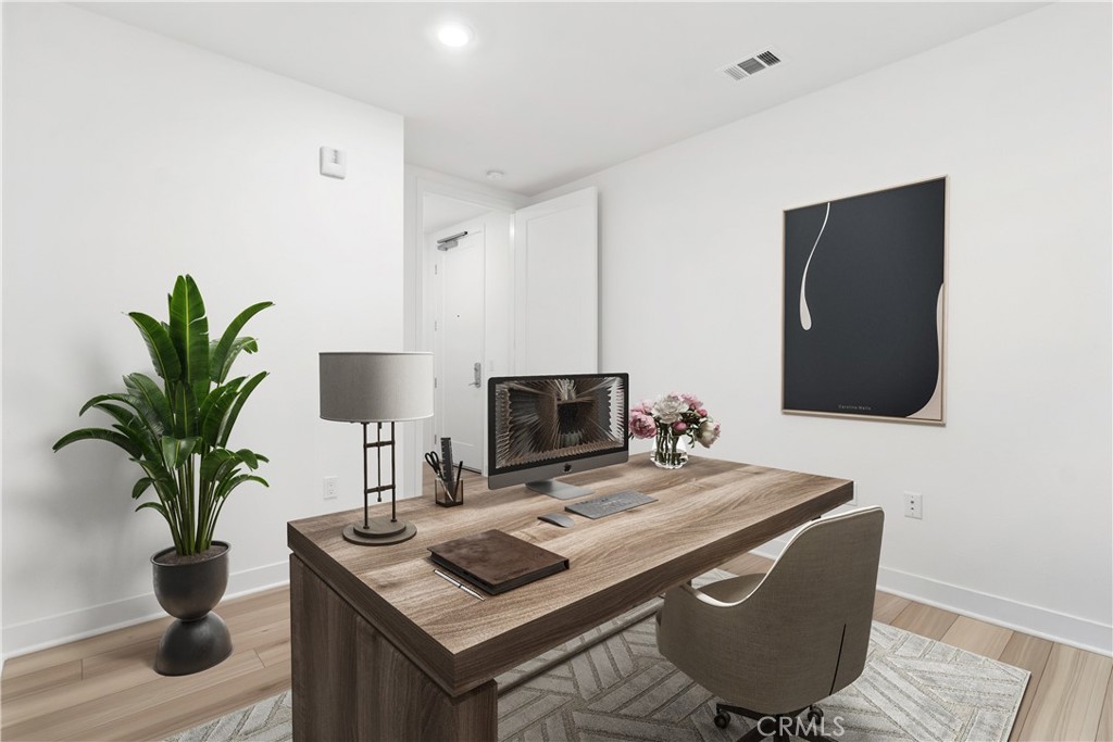 1202 Rivington Irvine, CA 92612 - Photo 17 of 52 a living room with furniture and a potted plant