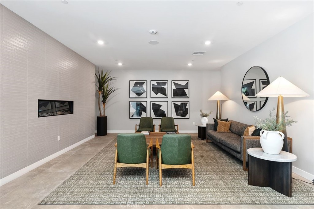 1202 Rivington Irvine, CA 92612 - Photo 35 of 52 a living room with furniture and a large window
