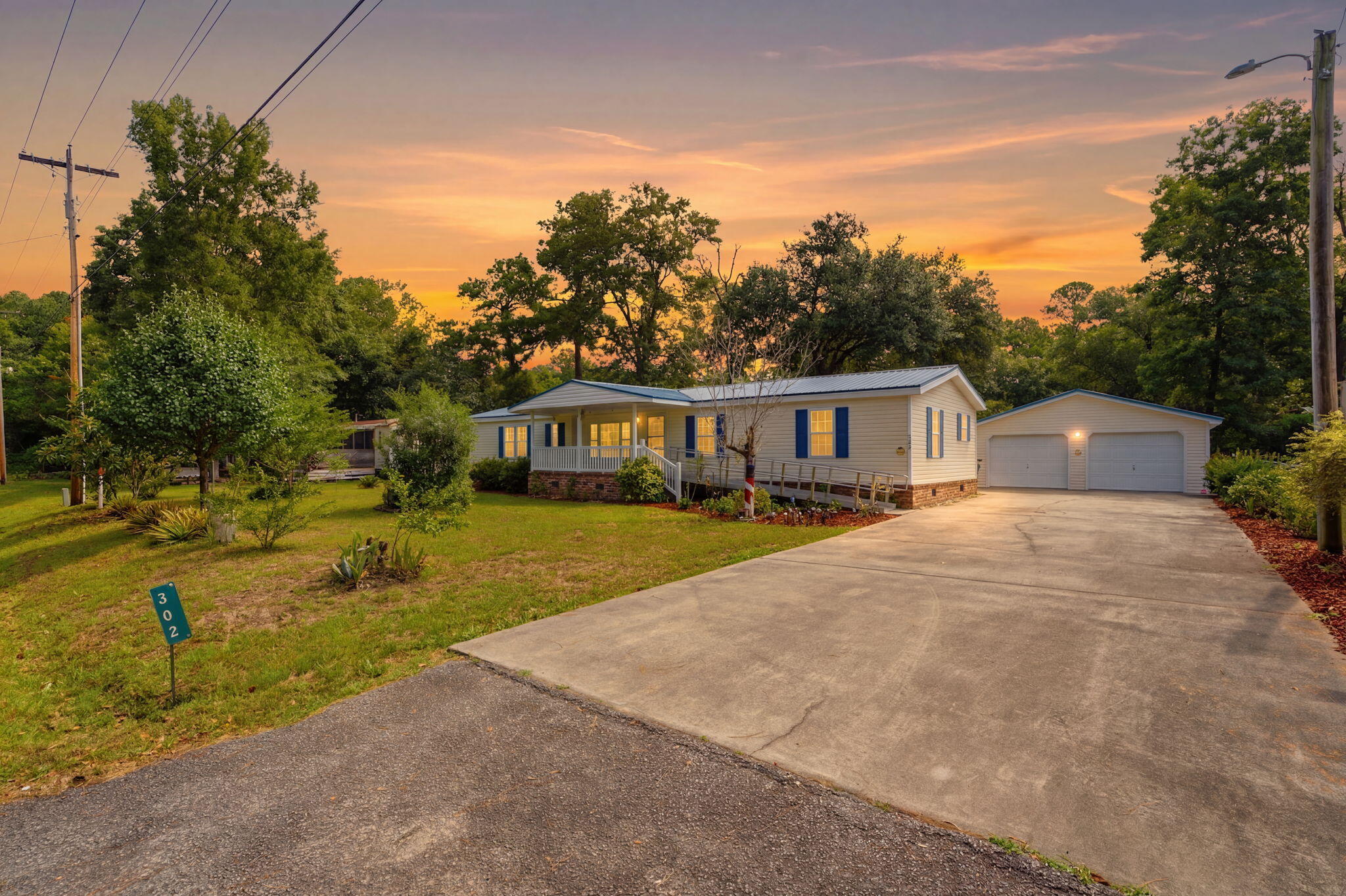 302 Butter Road Bonneau, SC 29431 - Photo 1 of 36 1-web-or-mls-_DSC4922_twilight_598bbe5a