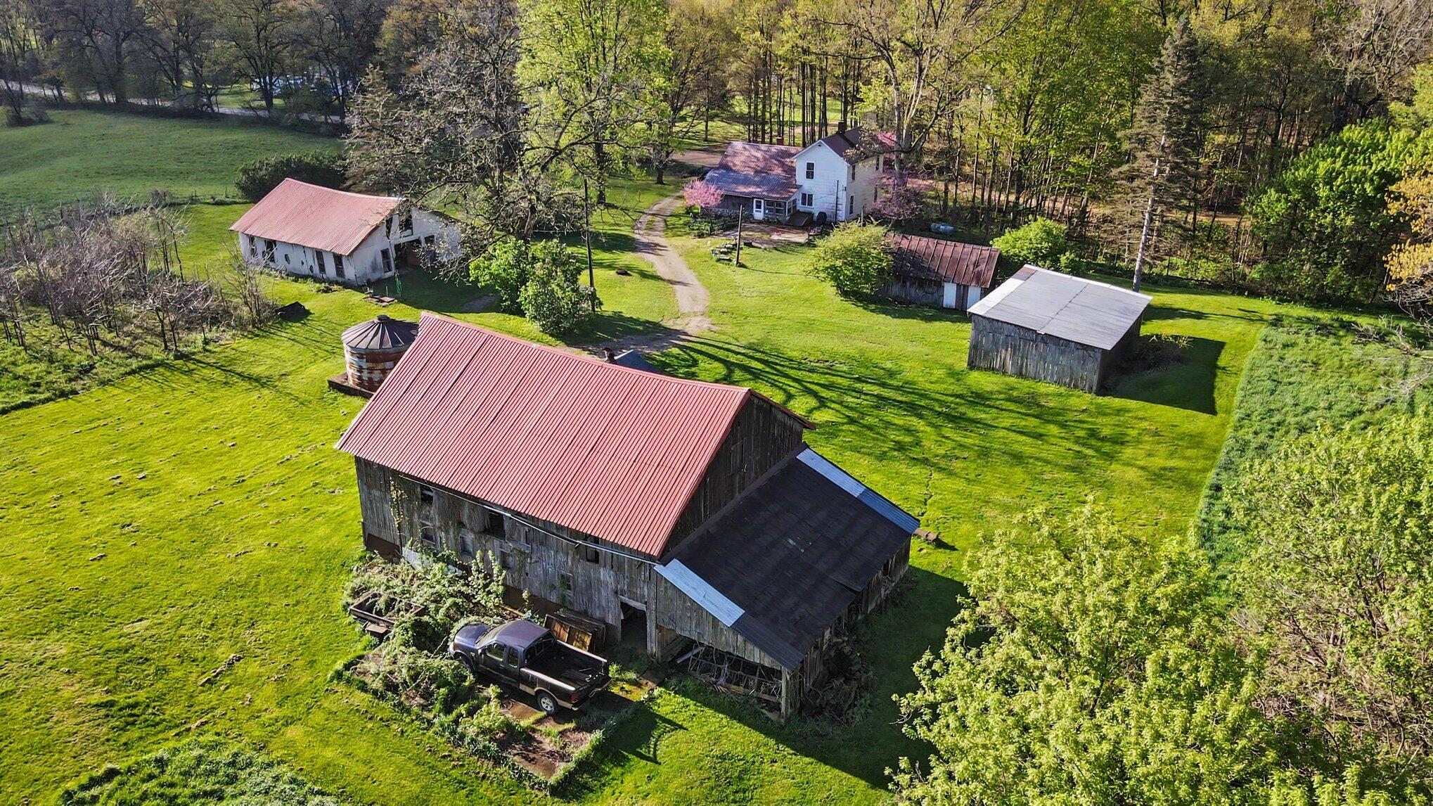 4360 Waldorf Road Delton, MI 49046 - Photo 25 of 34 Aerial View of House and Barns