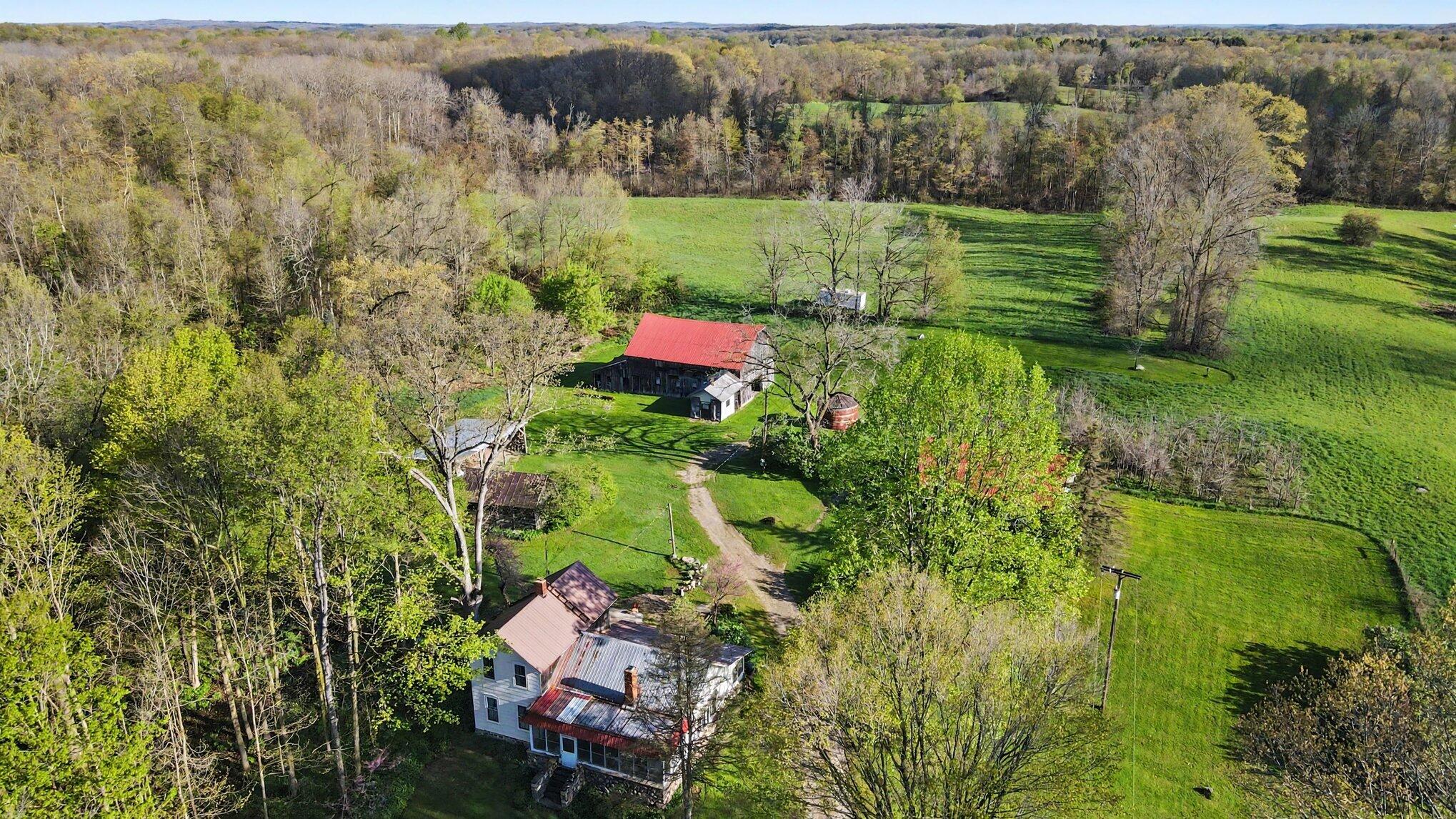 4360 Waldorf Road Delton, MI 49046 - Photo 26 of 34 Aerial View of House and Barns