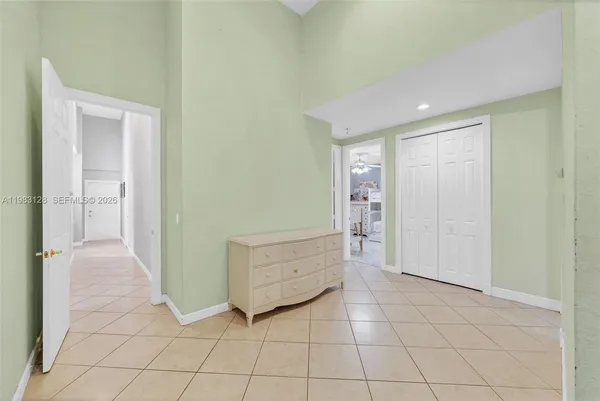 a view of hallway with livingroom