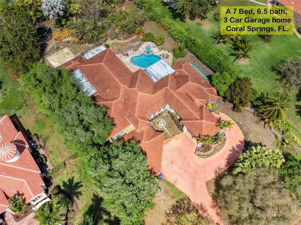 a dining room with furniture and front door view