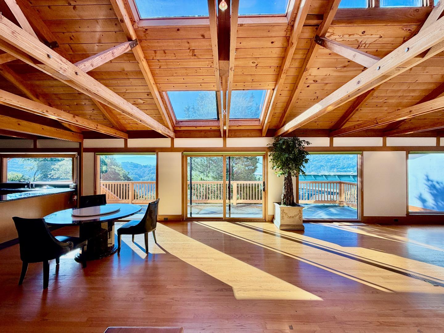 63 Berryessa Way Hillsborough, CA 94010 - Photo 12 of 39 a dining room with furniture and wooden floor