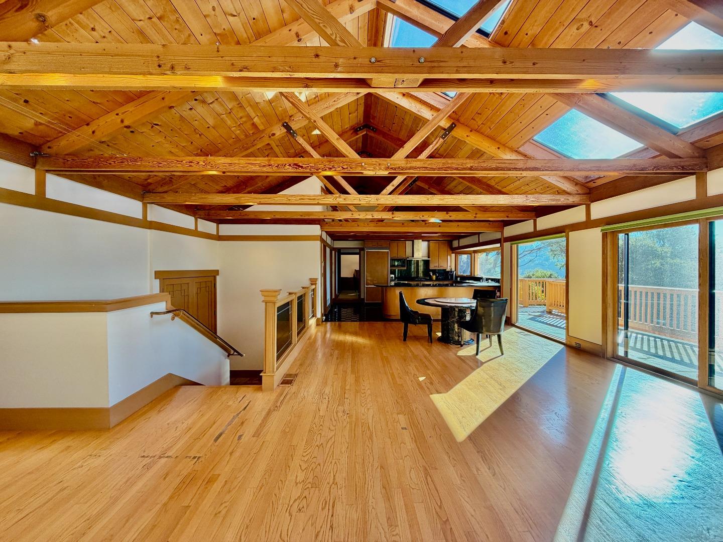 63 Berryessa Way Hillsborough, CA 94010 - Photo 13 of 39 a view of a patio with table and chairs with wooden floor