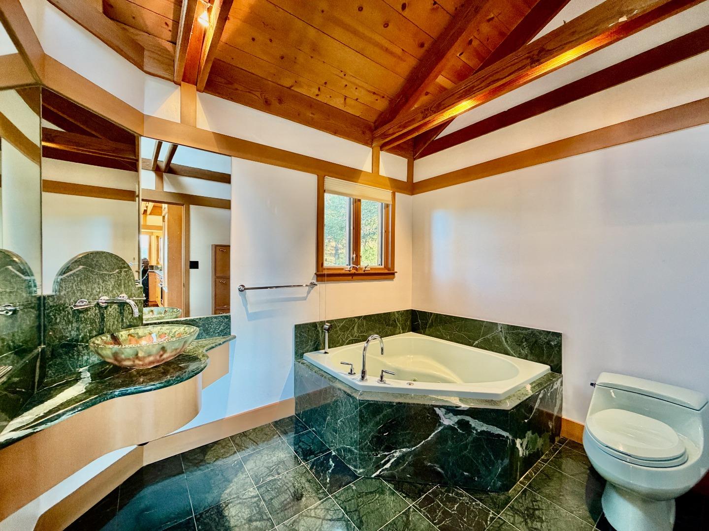 63 Berryessa Way Hillsborough, CA 94010 - Photo 20 of 39 a bathroom with a sink and a mirror