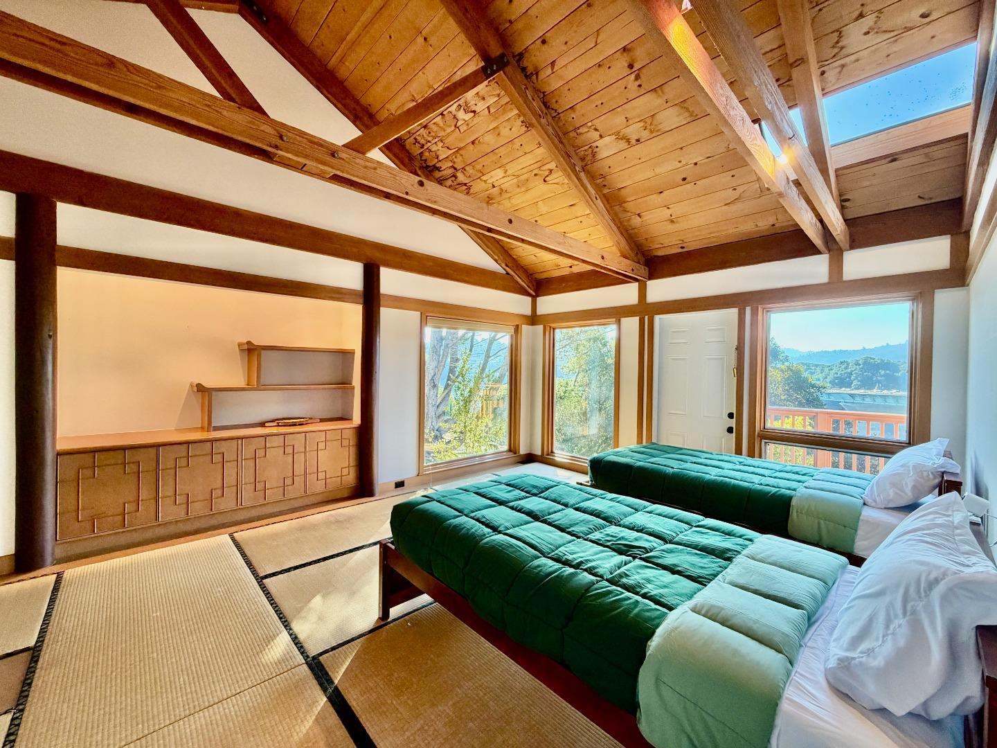 63 Berryessa Way Hillsborough, CA 94010 - Photo 21 of 39 a bedroom with furniture and large windows