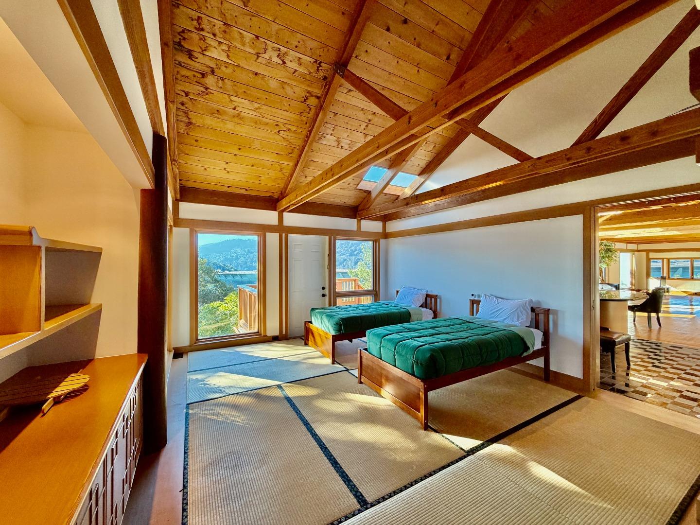 63 Berryessa Way Hillsborough, CA 94010 - Photo 24 of 39 a living room with furniture and a chandelier
