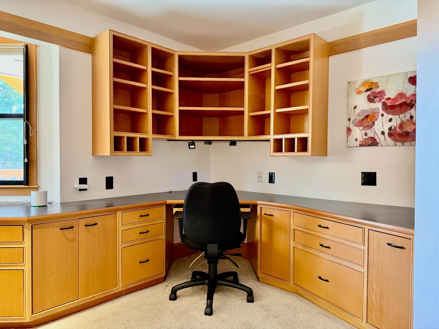 63 Berryessa Way Hillsborough, CA 94010 - Photo 32 of 39 a view of a workspace with furniture and a window