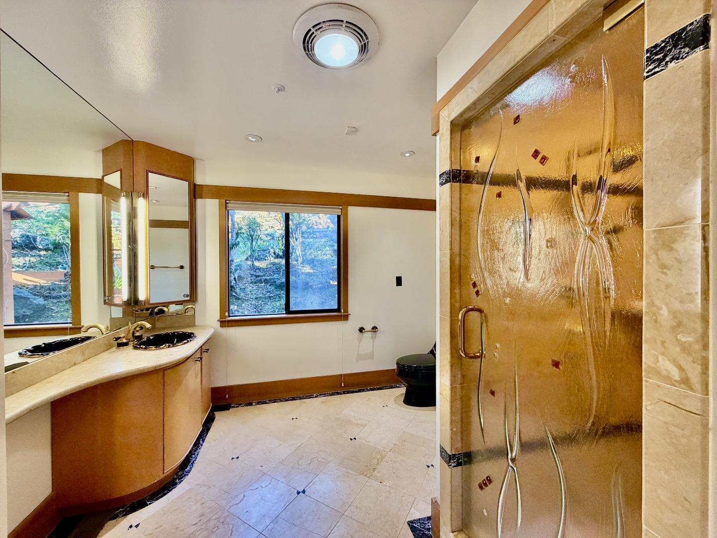 63 Berryessa Way Hillsborough, CA 94010 - Photo 36 of 39 a bathroom with a tub a sink and a window