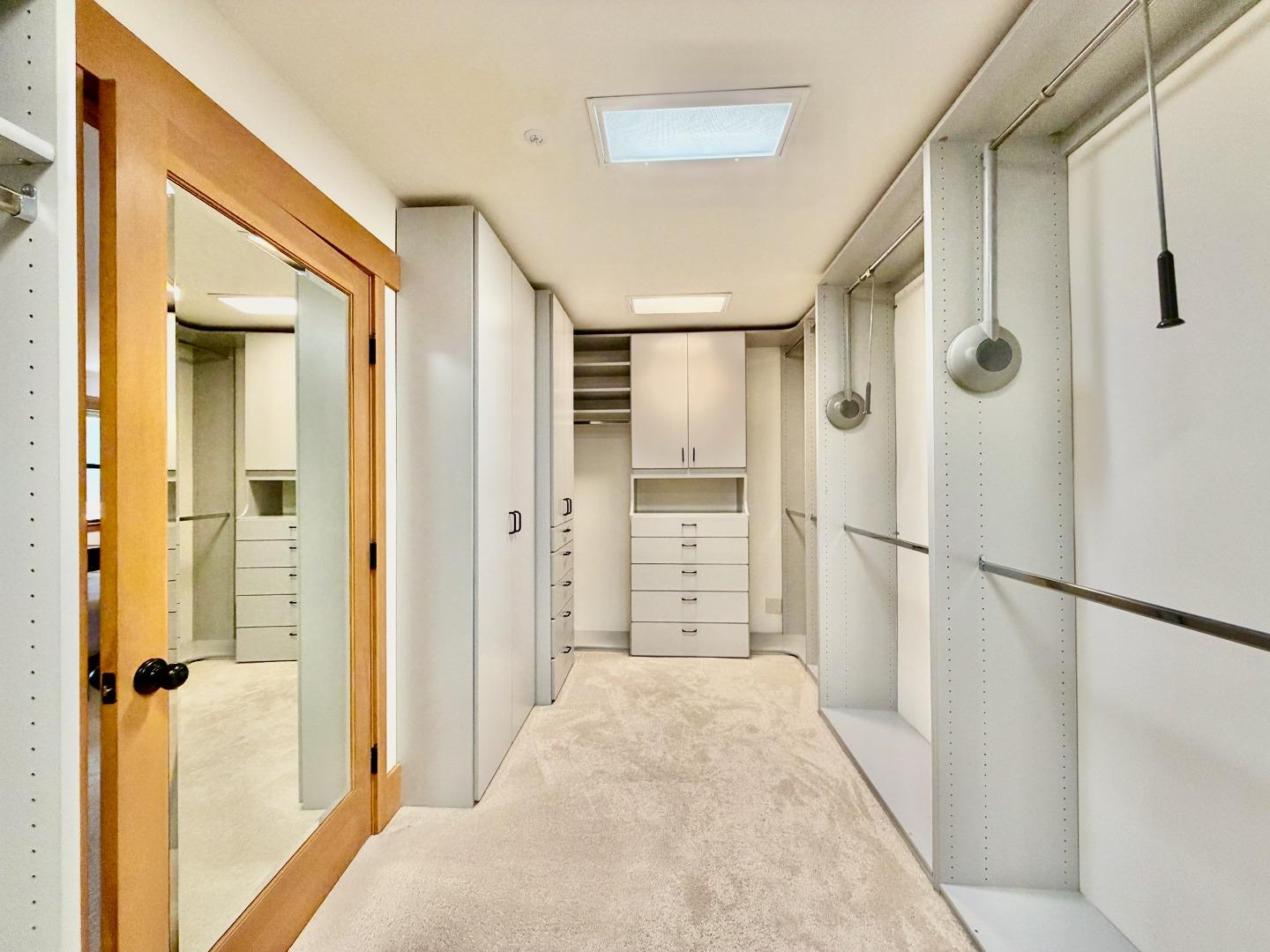 63 Berryessa Way Hillsborough, CA 94010 - Photo 37 of 39 a bathroom with a shower and a glass door