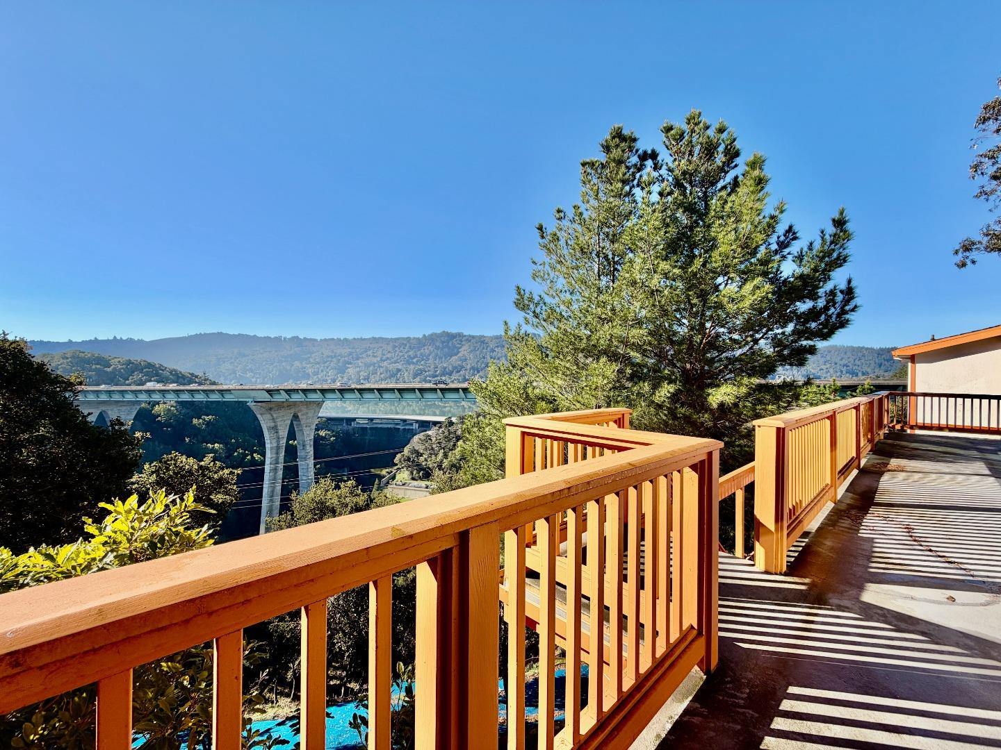 63 Berryessa Way Hillsborough, CA 94010 - Photo 39 of 39 a balcony with wooden floor and city view