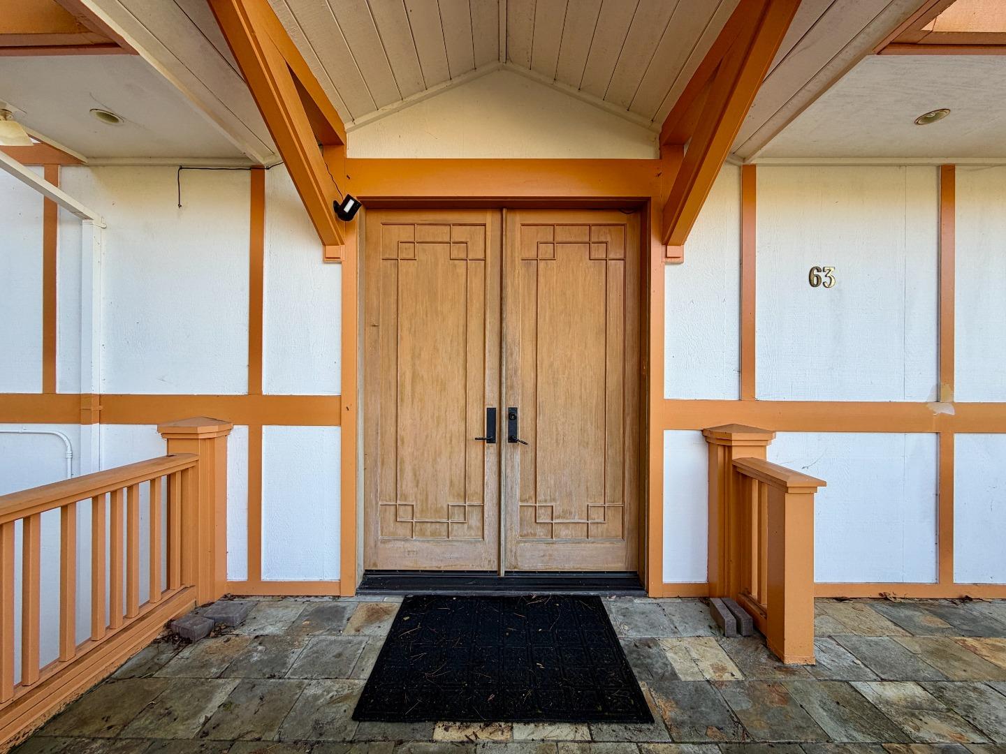 63 Berryessa Way Hillsborough, CA 94010 - Photo 4 of 39 a view of a door and wooden floor