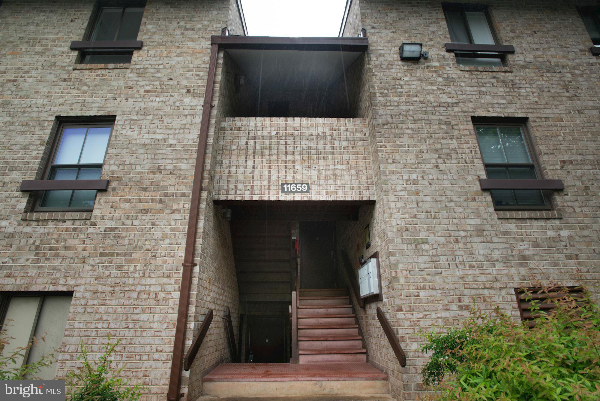 11659 Stoneview Square, Unit 21C Reston, VA 20191 - Photo 3 of 23 Exterior (Front)