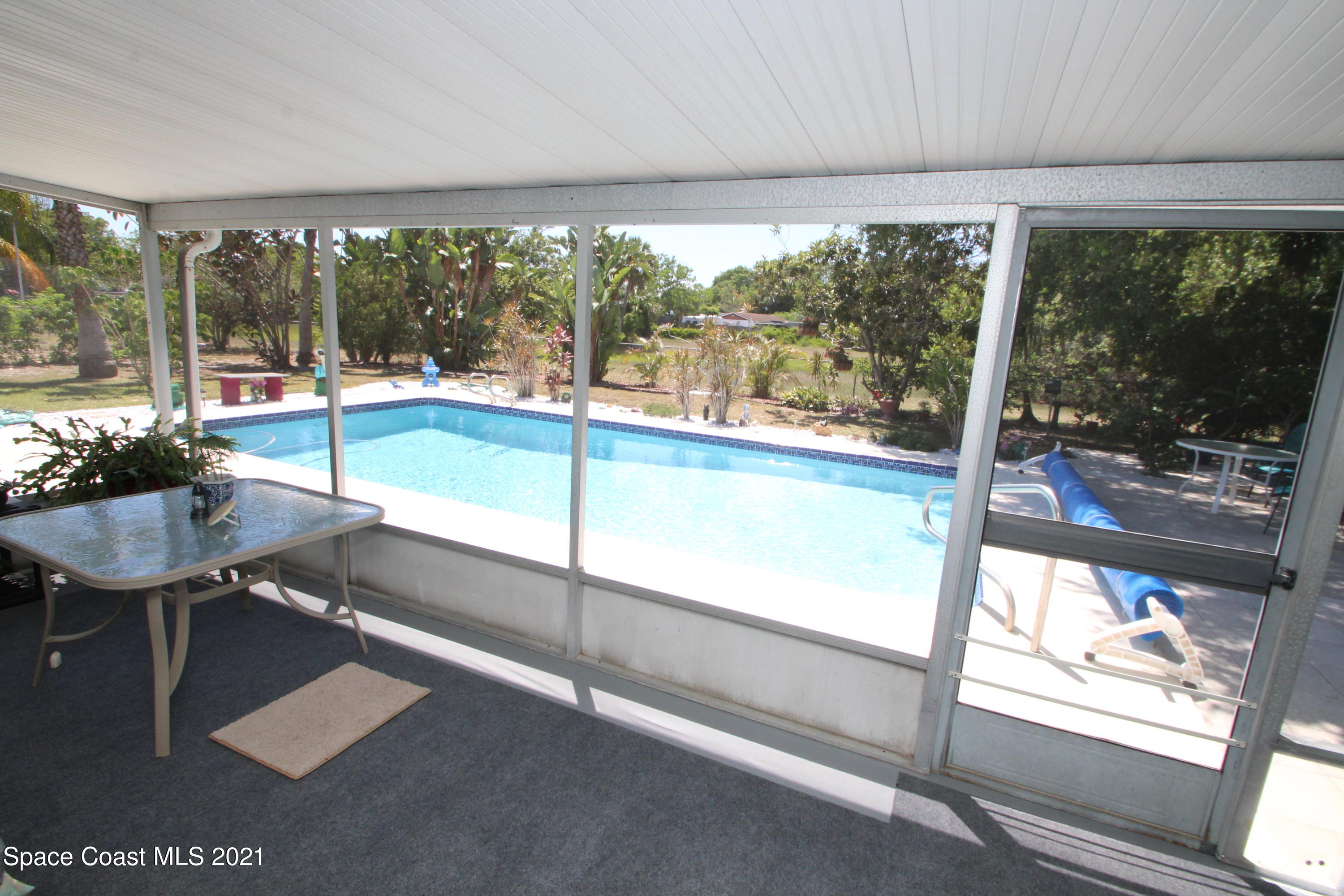 1398 Creel Road Northeast Palm Bay, FL 32905 - Photo 22 of 37 a view of a room with a large window