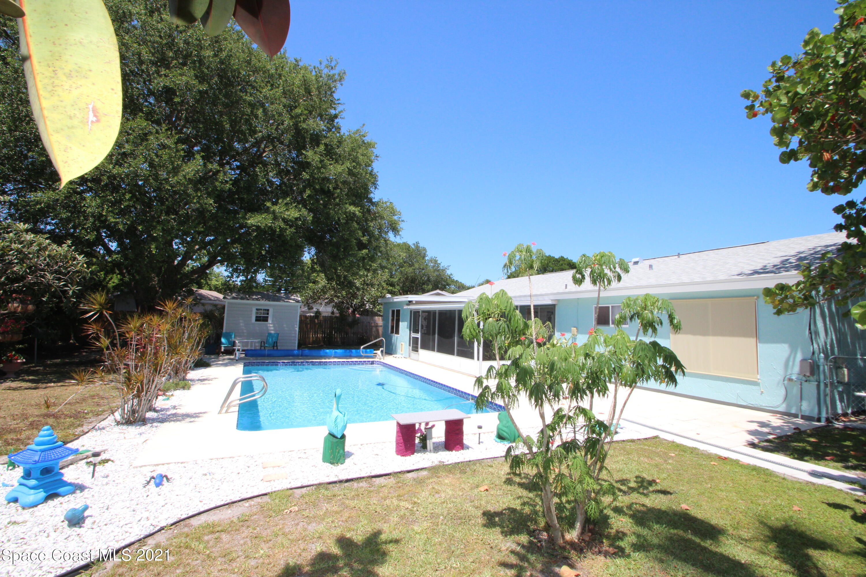 1398 Creel Road Northeast Palm Bay, FL 32905 - Photo 28 of 37 swimming pool view with a outdoor space