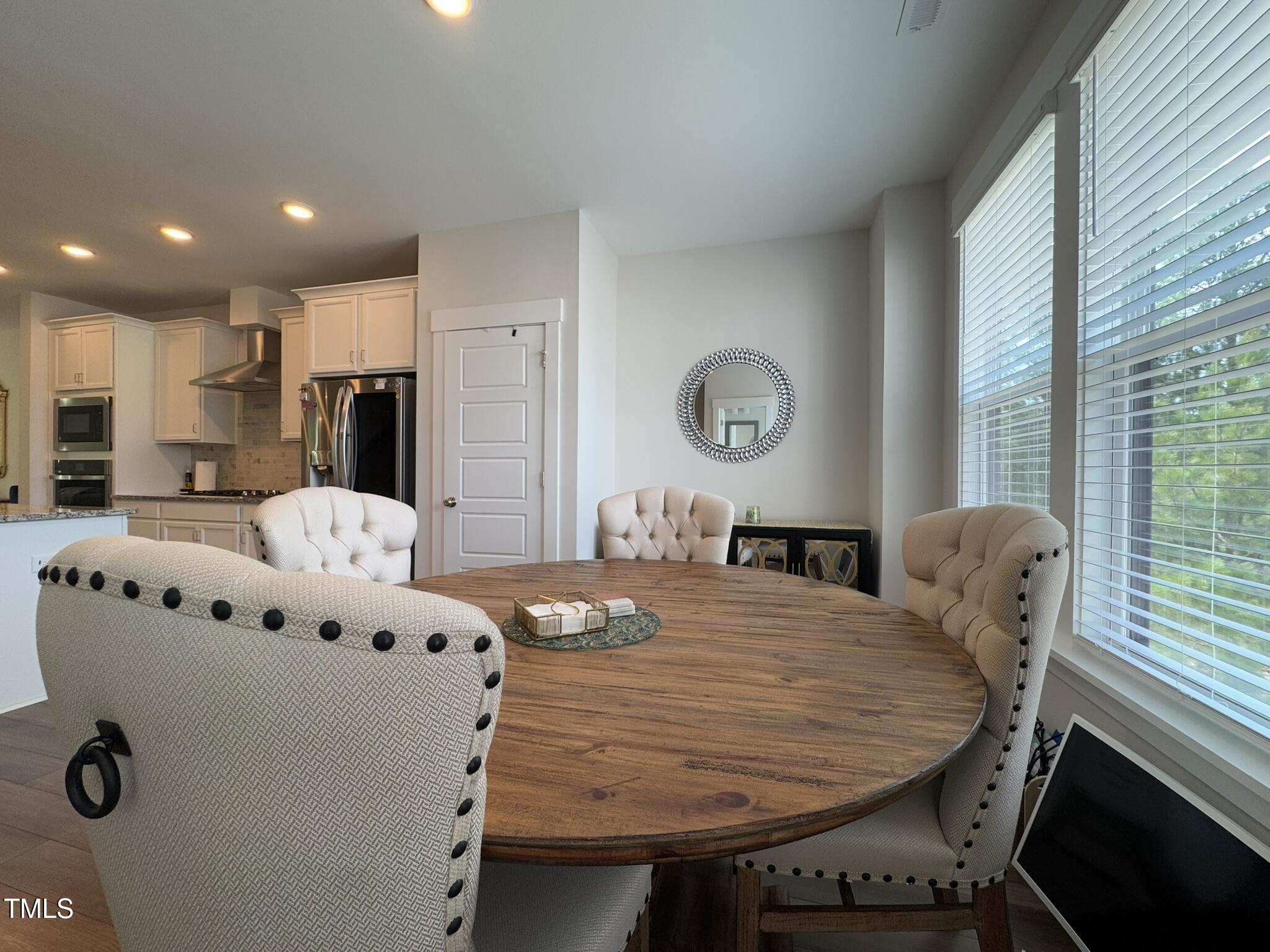 1244 Corkery Ridge Court Cary, NC 27519 - Photo 11 of 37 a living room with furniture and a large window