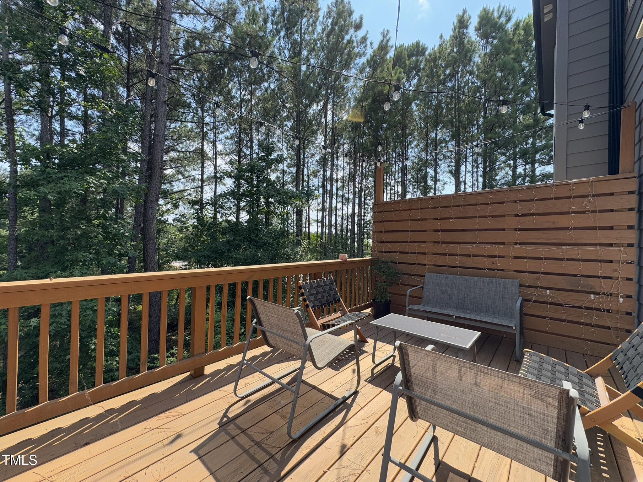 1244 Corkery Ridge Court Cary, NC 27519 - Photo 13 of 37 a view of balcony with wooden floor and outdoor seating