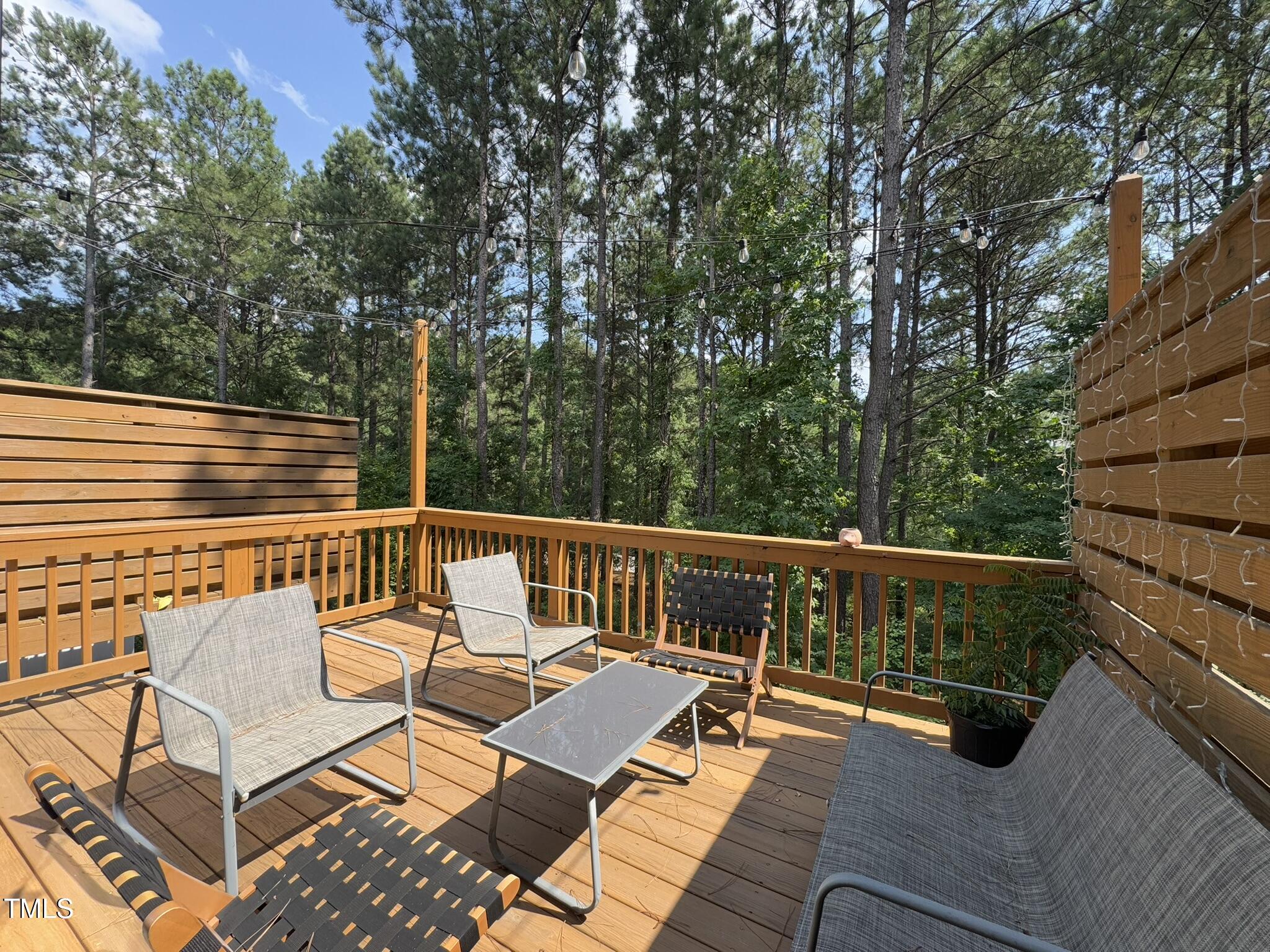 1244 Corkery Ridge Court Cary, NC 27519 - Photo 14 of 37 a view of balcony with wooden floor and outdoor seating