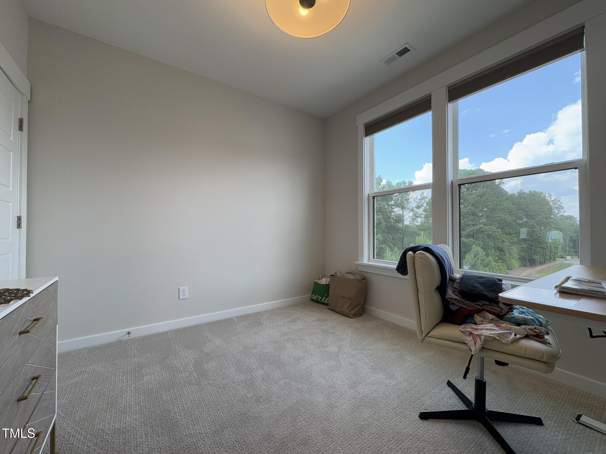 1244 Corkery Ridge Court Cary, NC 27519 - Photo 27 of 37 a view of a workspace with a window