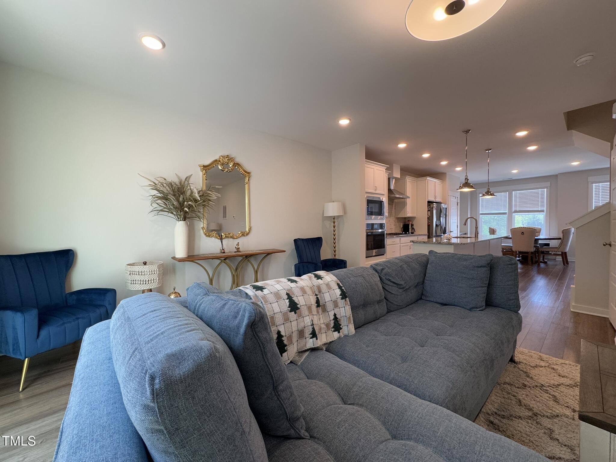 1244 Corkery Ridge Court Cary, NC 27519 - Photo 4 of 37 a living room with furniture and a couch