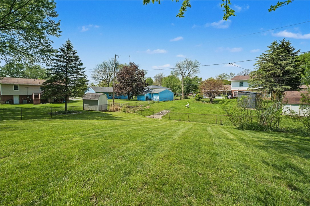 4919 Silver Arrow Drive Riverside, OH 45424 - Photo 50 of 57 Expansive green space with mature trees and a tranquil backdrop of residential homes.