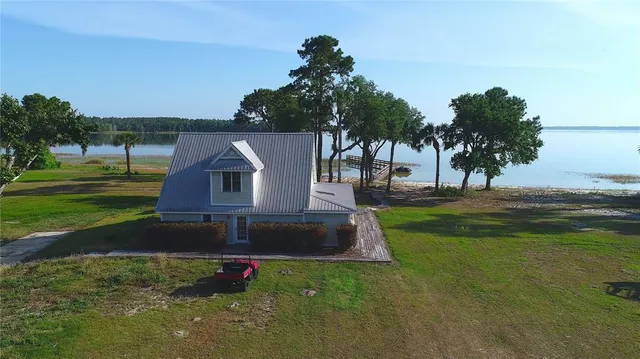 front view of a house with a garden