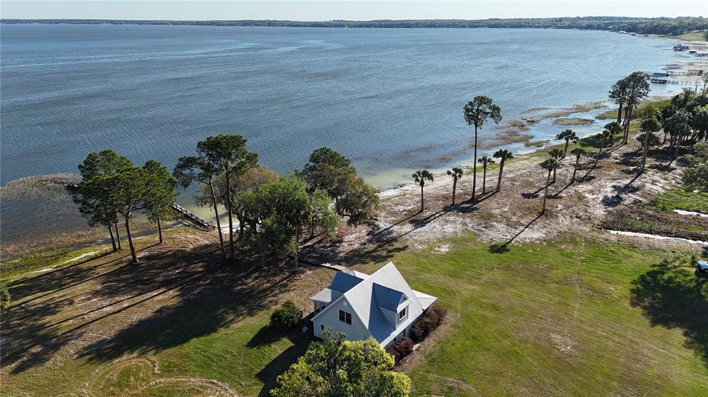 12115 Southeast Sunset Harbor Road Weirsdale, FL 32195 - Photo 2 of 35 a view of yard