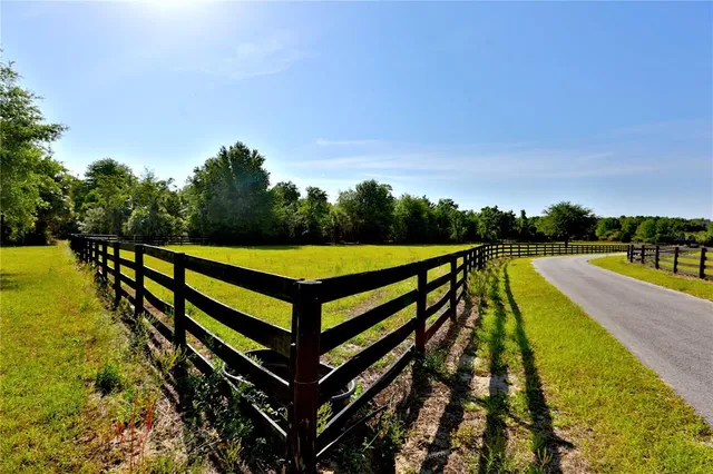 a view of a bench in front of a building