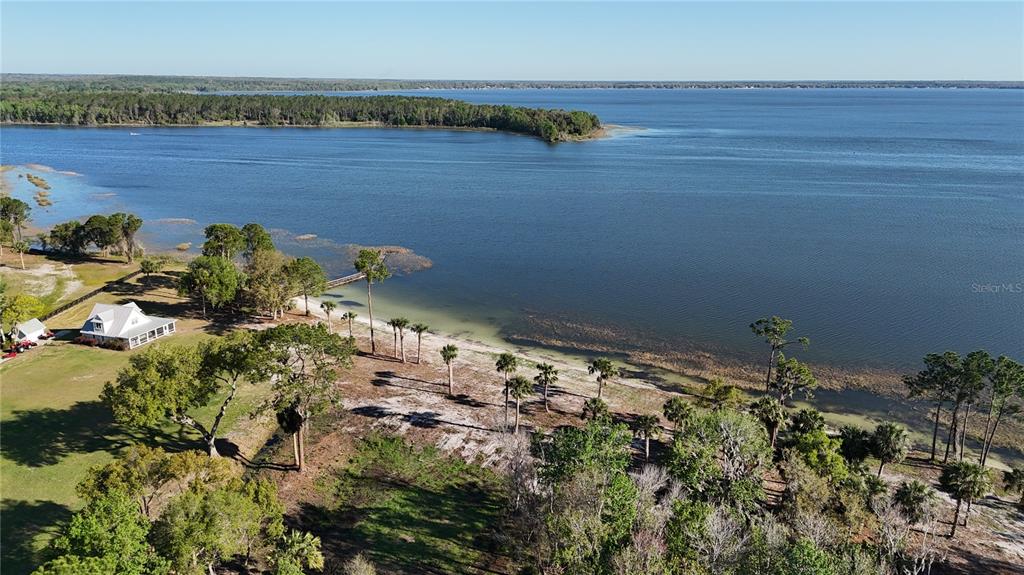 12115 Southeast Sunset Harbor Road Weirsdale, FL 32195 - Photo 4 of 35 a view of a lake view