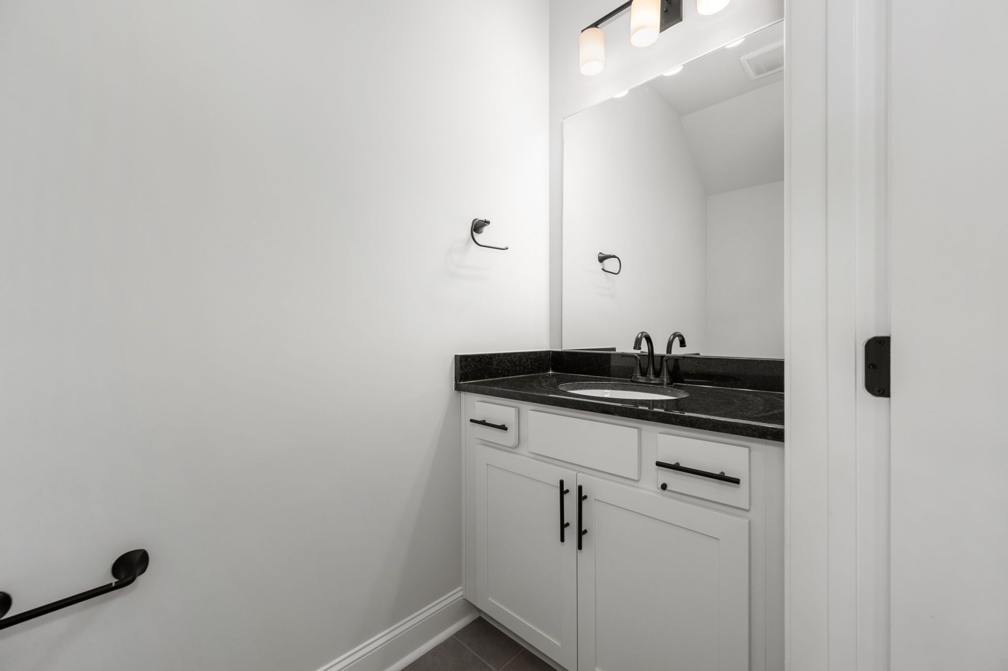 512 Rohan Drive Murfreesboro, TN 37129 - Photo 8 of 32 a close up of a sink and a mirror