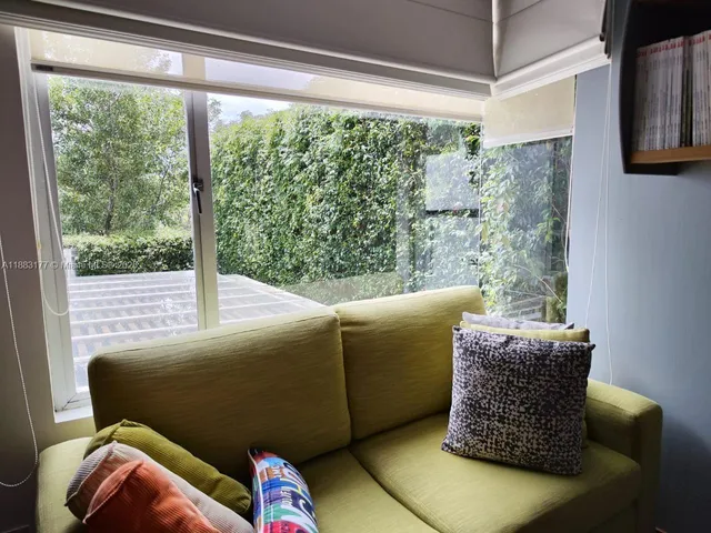 a view of a room with rack on the wall