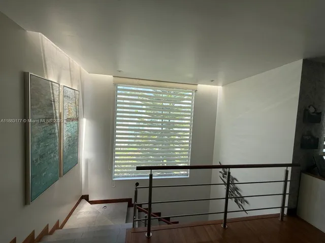 a picture of a book and a bed