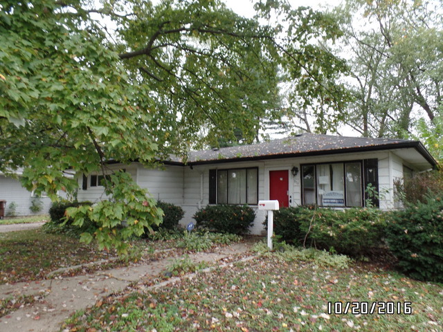 276 Rich Road Park Forest, IL 60466 - Photo 1 of 18 a front view of a house with garden