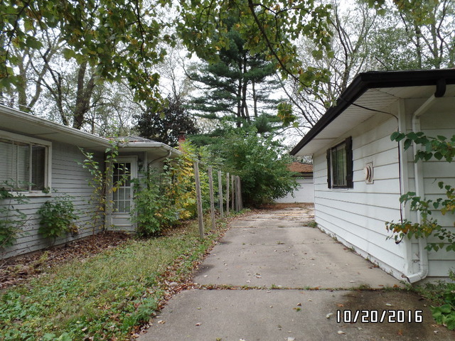 276 Rich Road Park Forest, IL 60466 - Photo 17 of 18 a view of a house with a yard