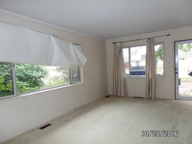 276 Rich Road Park Forest, IL 60466 - Photo 3 of 18 a view of an empty room with a window