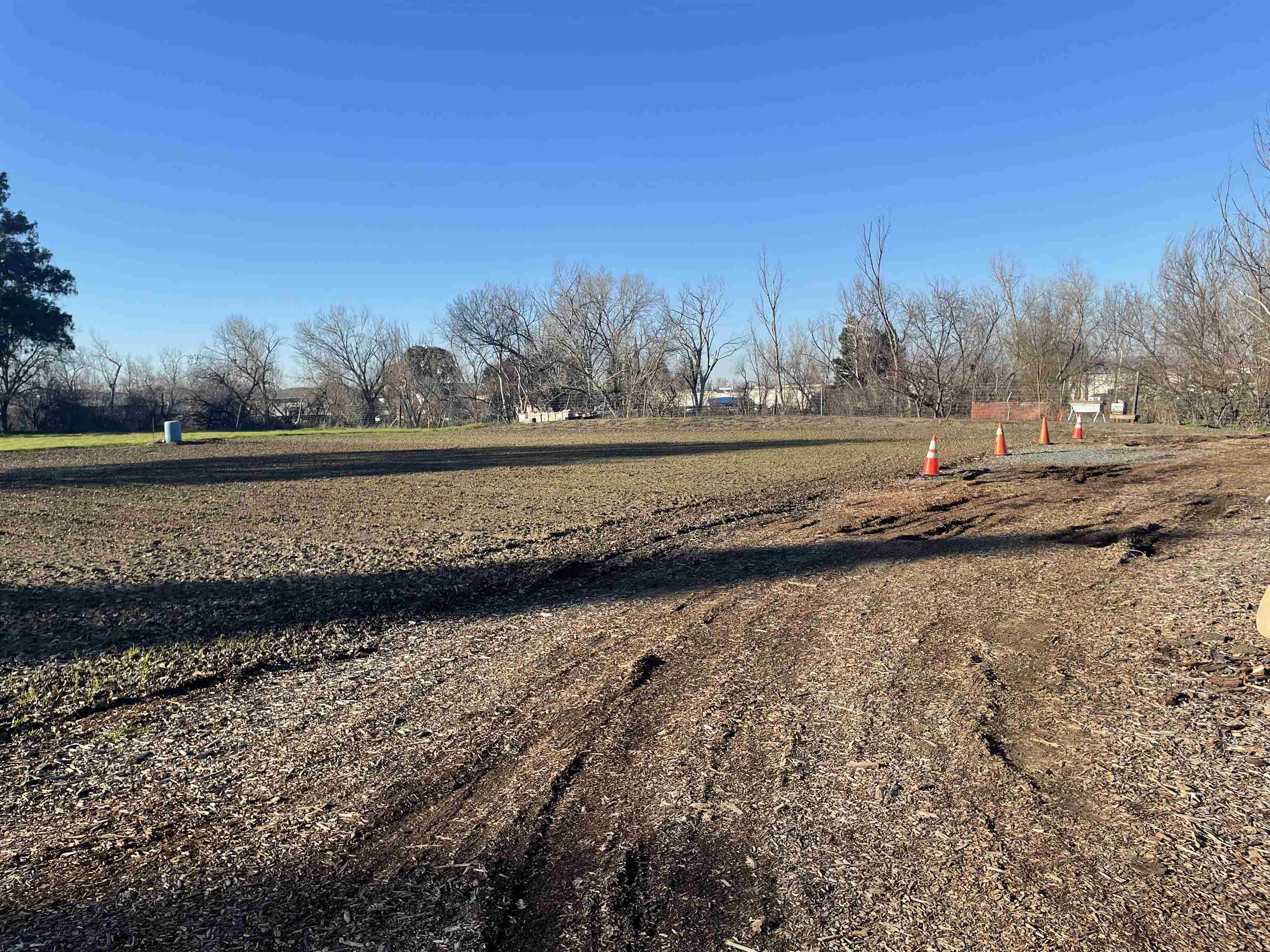 327 Linden Way Pleasanton, CA 94566 - Photo 4 of 7 a view of a lake with beach and trees in the background