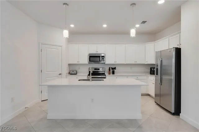 $315,000 | 9146 Leatherwood Loop, Lehigh Acres, FL 33936