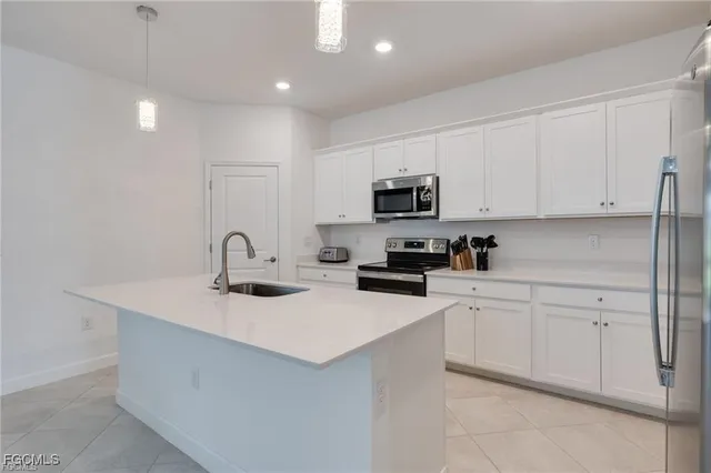 $315,000 | 9146 Leatherwood Loop, Lehigh Acres, FL 33936