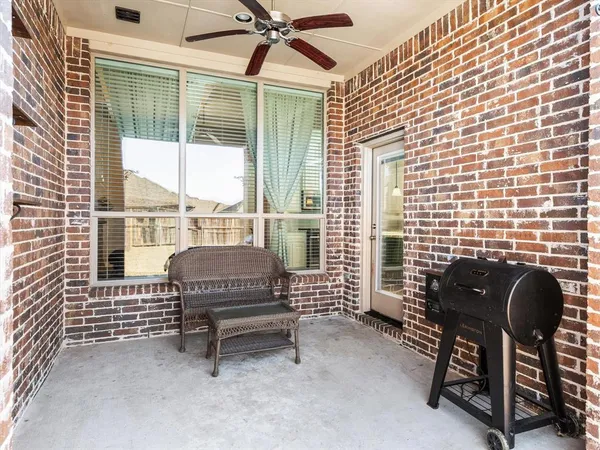 a balcony with furniture