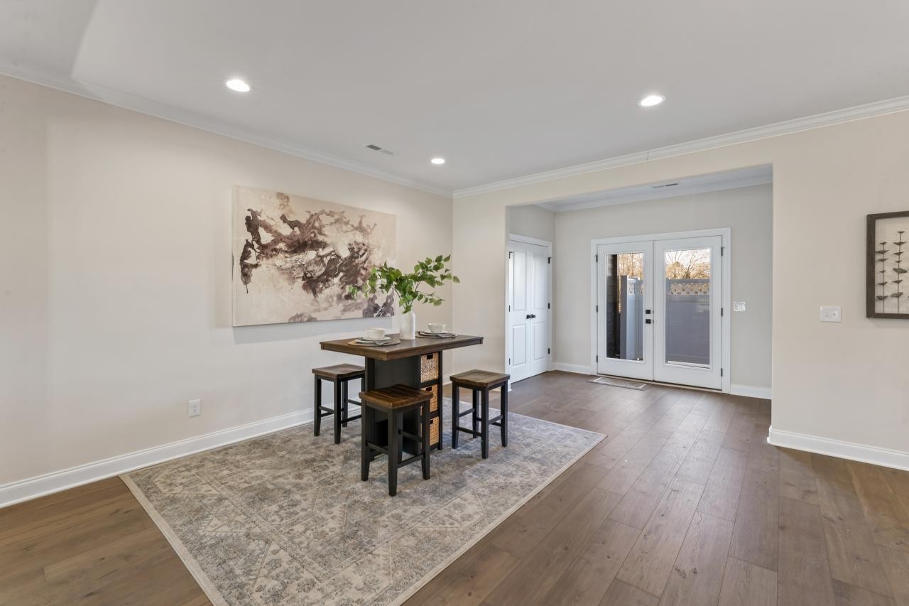 2128 Gracie Bug Loop Murfreesboro, TN 37128 - Photo 11 of 23 a view of a dining room with furniture and wooden floor