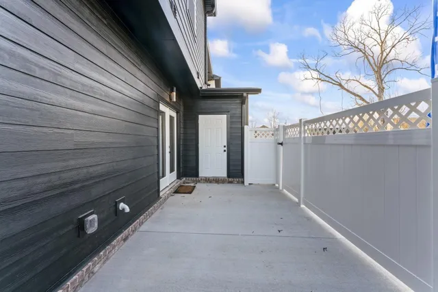 a view of a door and a window