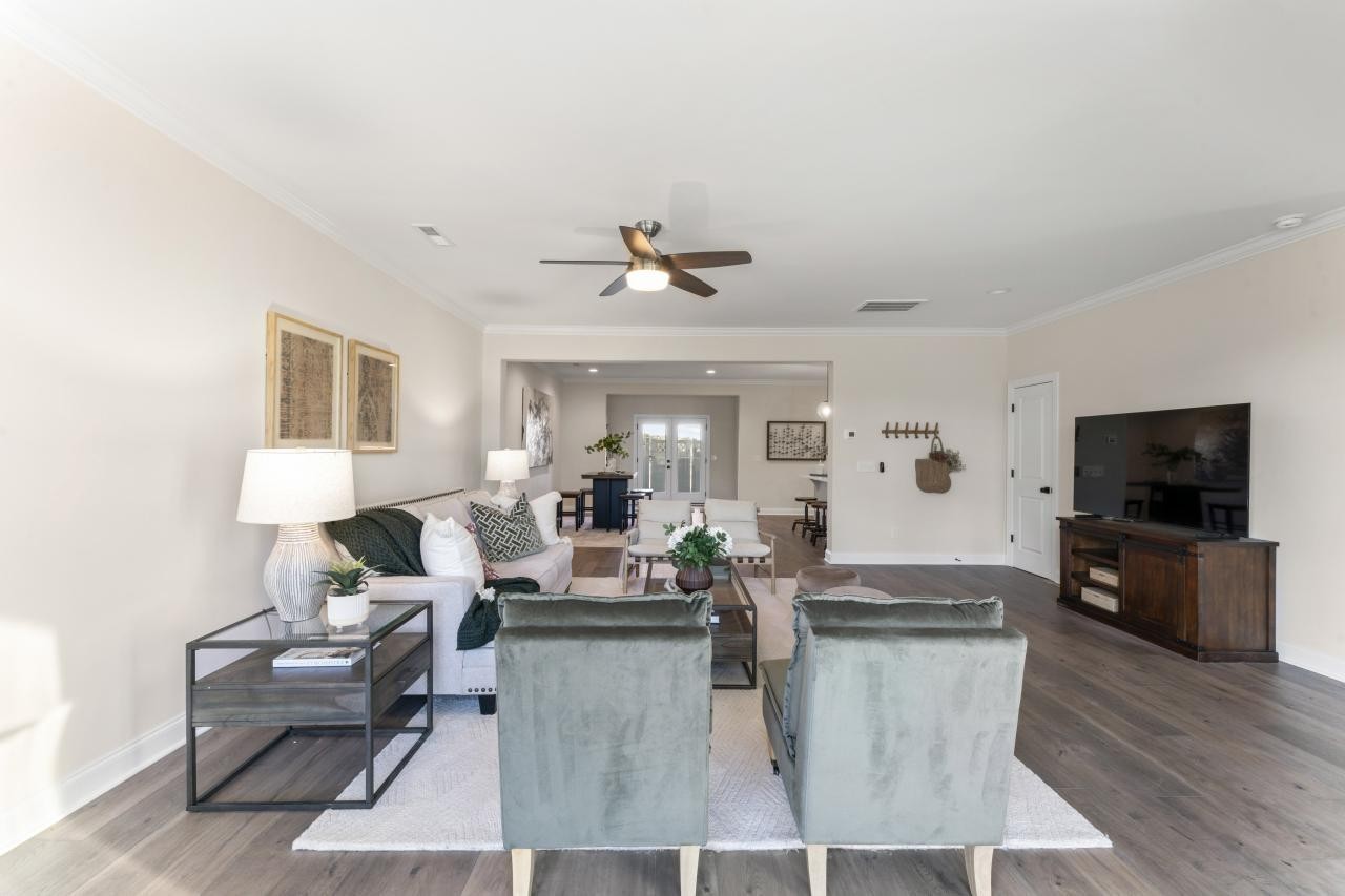 2128 Gracie Bug Loop Murfreesboro, TN 37128 - Photo 6 of 23 a living room with furniture and a flat screen tv