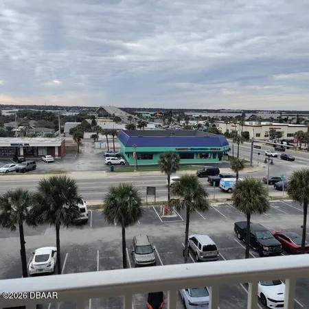 a view of a entryway door with living room