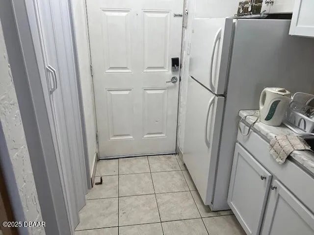a bathroom with a granite countertop shower and a sink